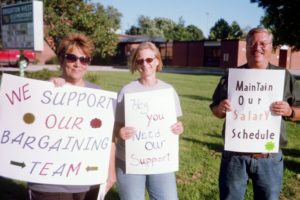 SWESPA members protest the possible loss of their salary schedule during contract negotiations. An October 5 tentative agreement maintains the schedule with its step increases. 